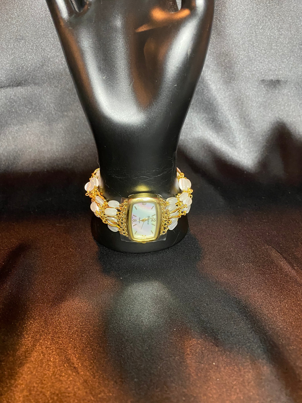 Gold tone opal chain link watch