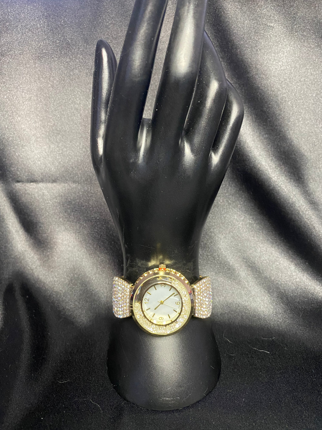 Gold tone pave bangle watch